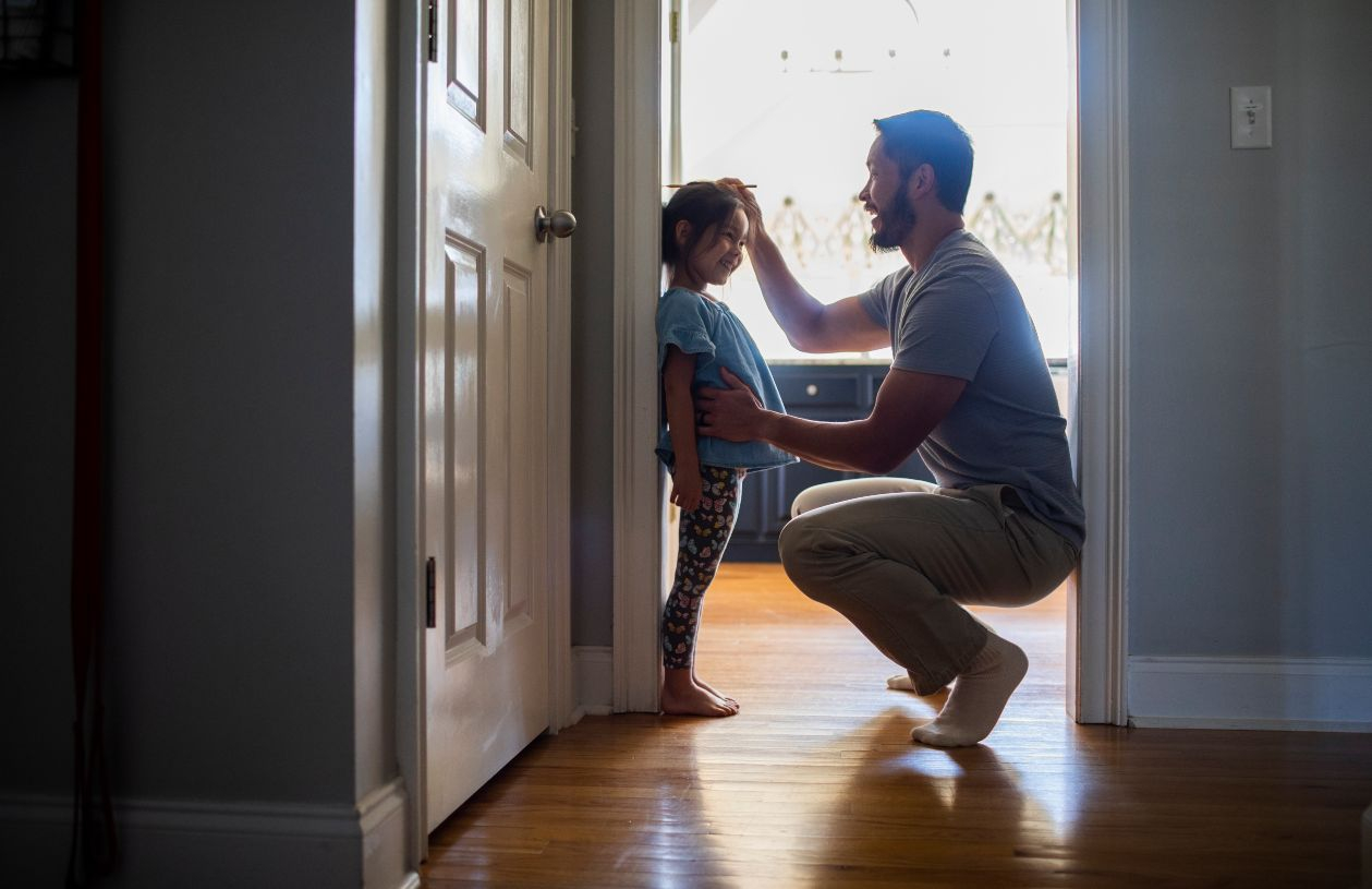 A dad and daughter enjoy their home after choosing the right mortgage for them.
