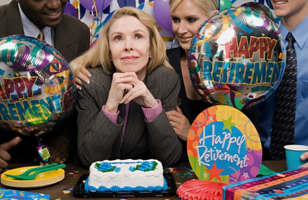 Woman wonders if she's making the most of her retirement benefits surrounded by co-workers at a retirement party.