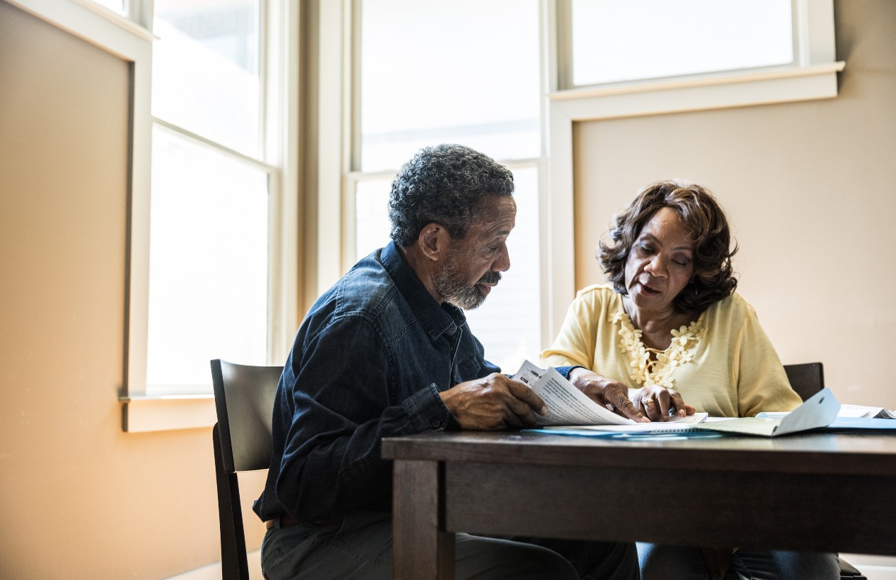 A couple goes over their finances.