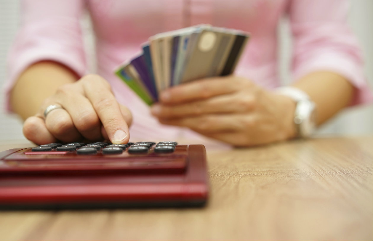 Person reviewing how many credit cards you should have