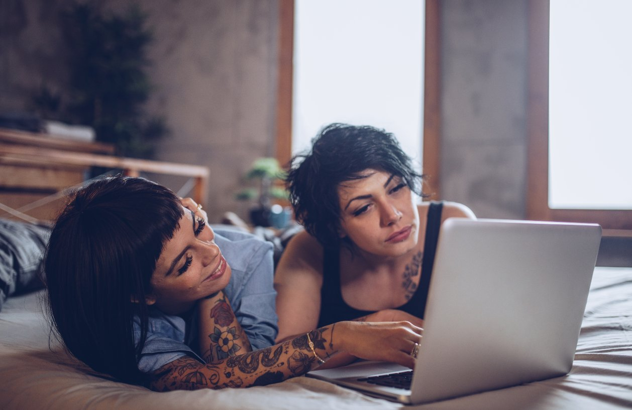 A couple researches what they need for a 20 percent down payment.