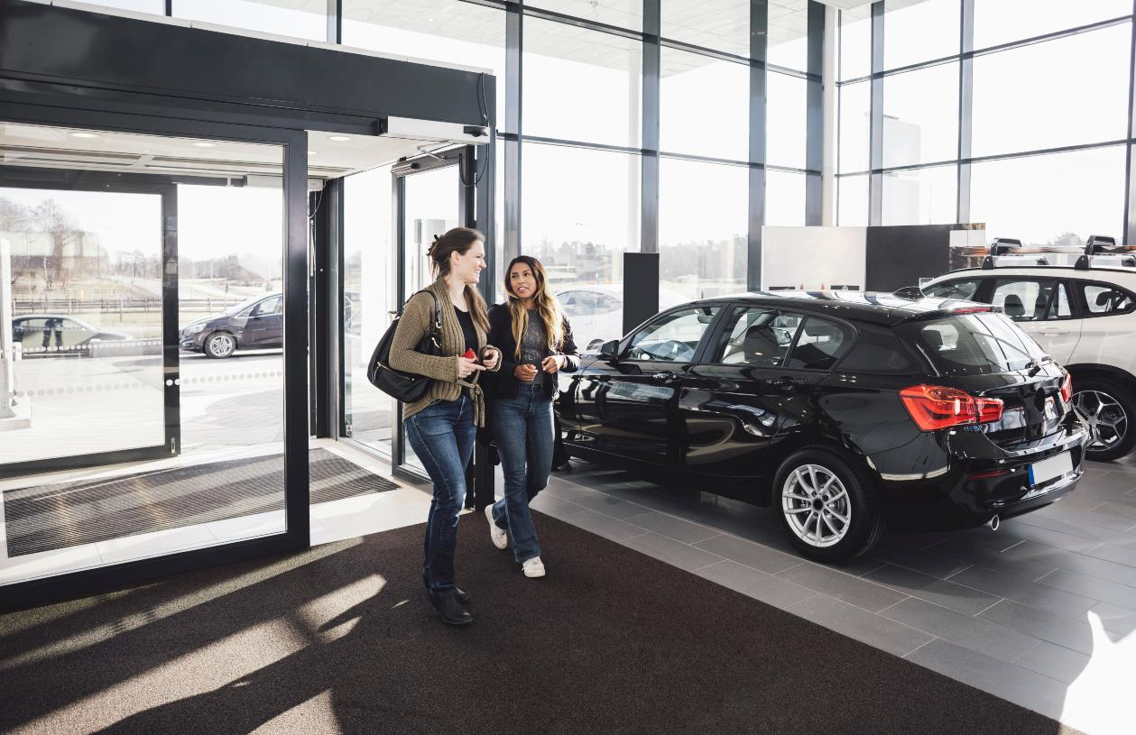 Friends decide on a new or used car