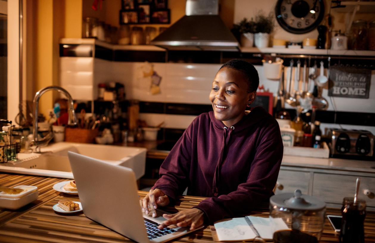 A woman follows Suze Orman's advice and uses a Roth IRA or Roth 401(k) today 